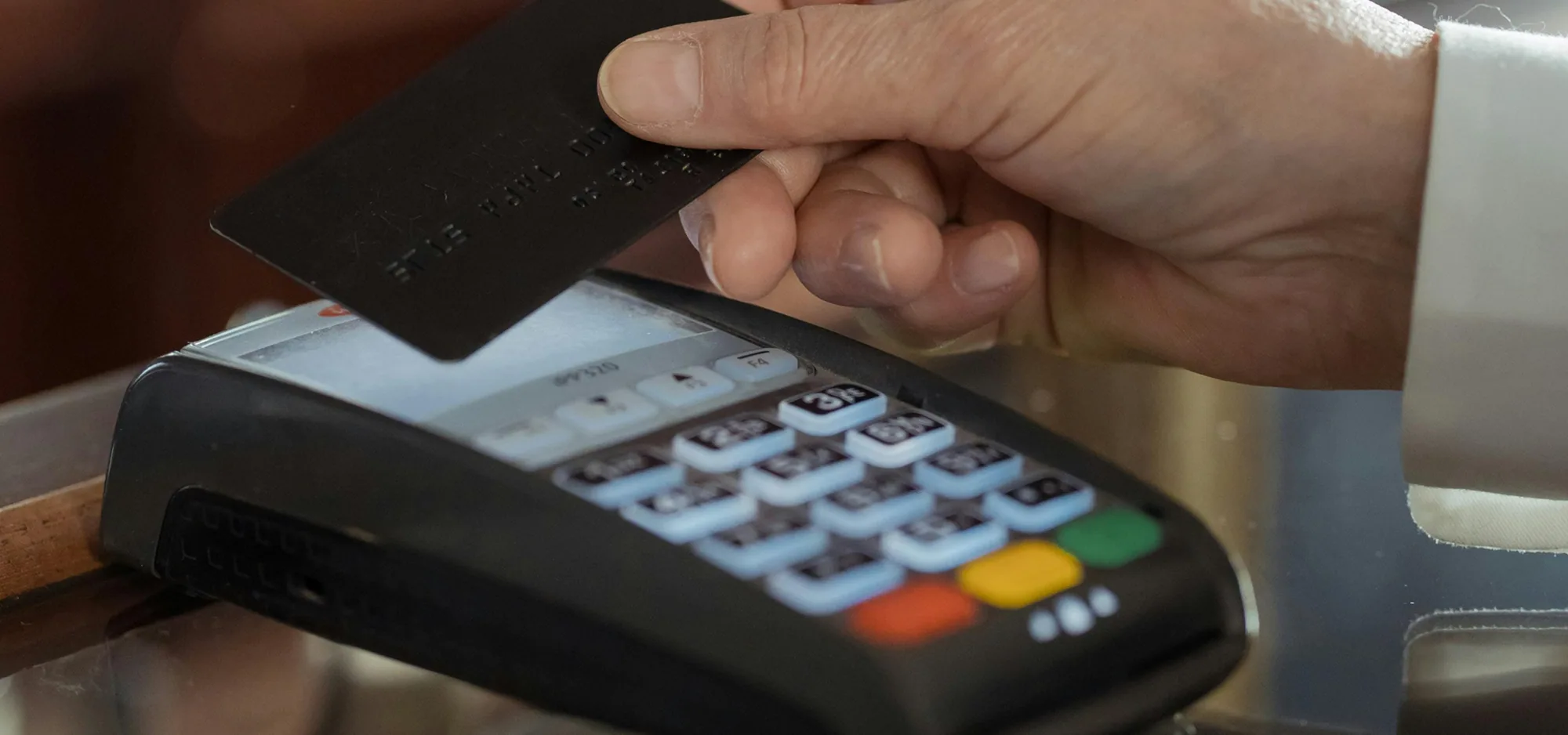 Credit card being used on a payment terminal