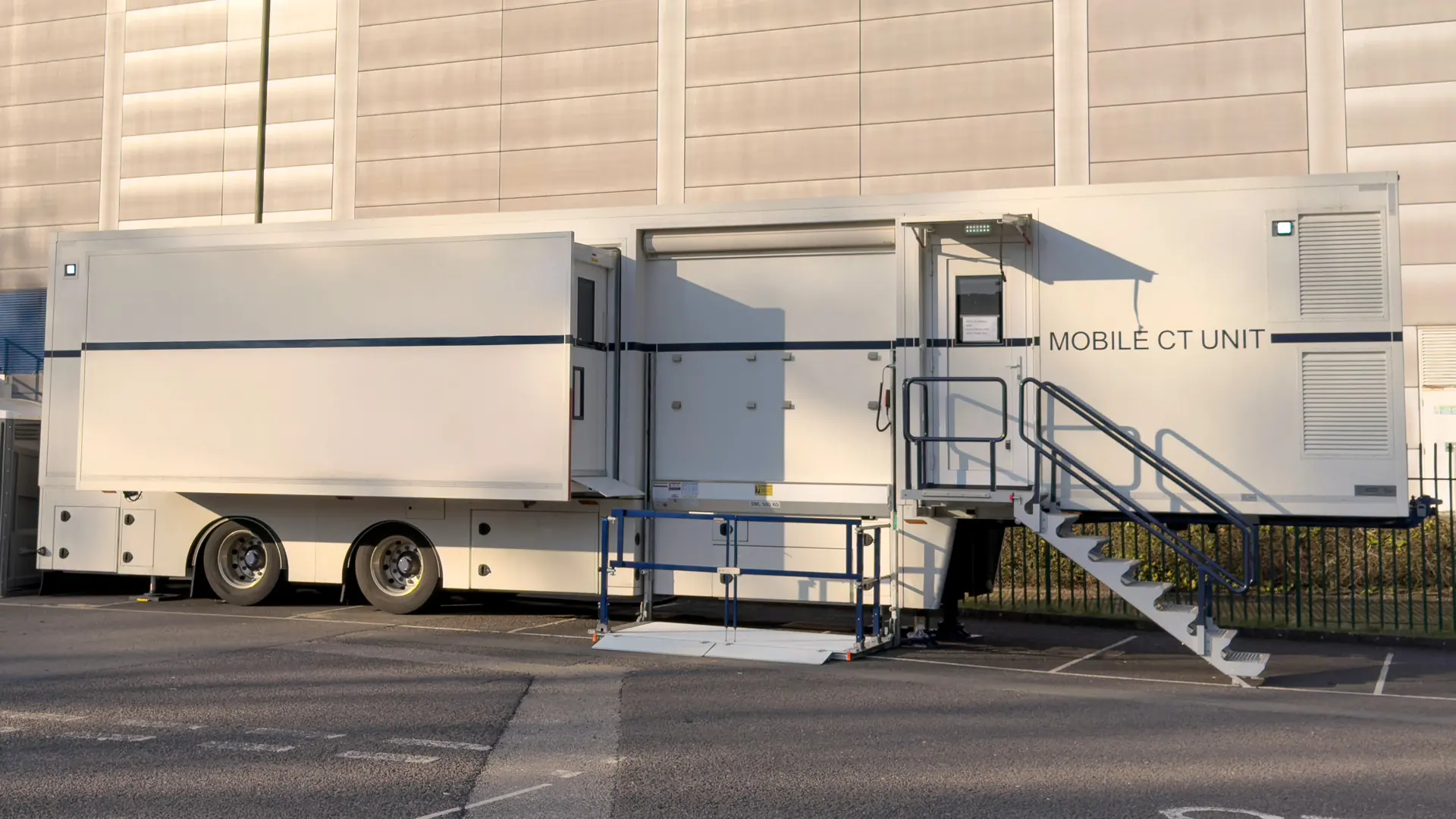 Mobile CT unit trailer parked outside a medical facility